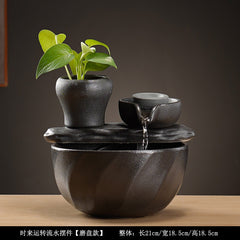 Tabletop fountain with plant pot